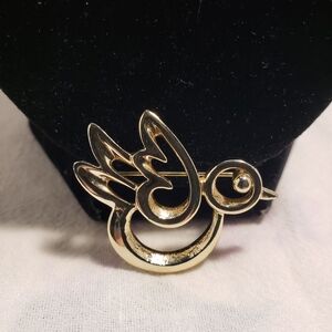 Cute Vintage Sarah Coventry Goldtone Flying Doodle Bird Brooch from 1970's